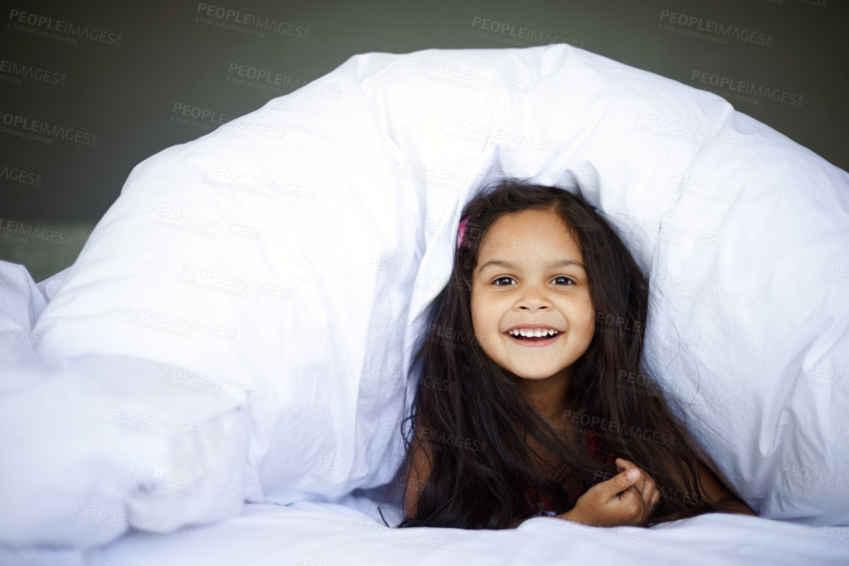 Buy stock photo Home, happy and little girl in portrait in bed for relaxing, resting and comfortable with smile. House, bedroom and child under cover, duvet and adorable kid lying with innocent face in morning