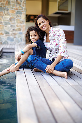 Buy stock photo Deck, portrait and swimming pool with mother and son outdoor in garden together for family bonding. Love, relax and water with happy woman single parent embracing boy child in backyard of home