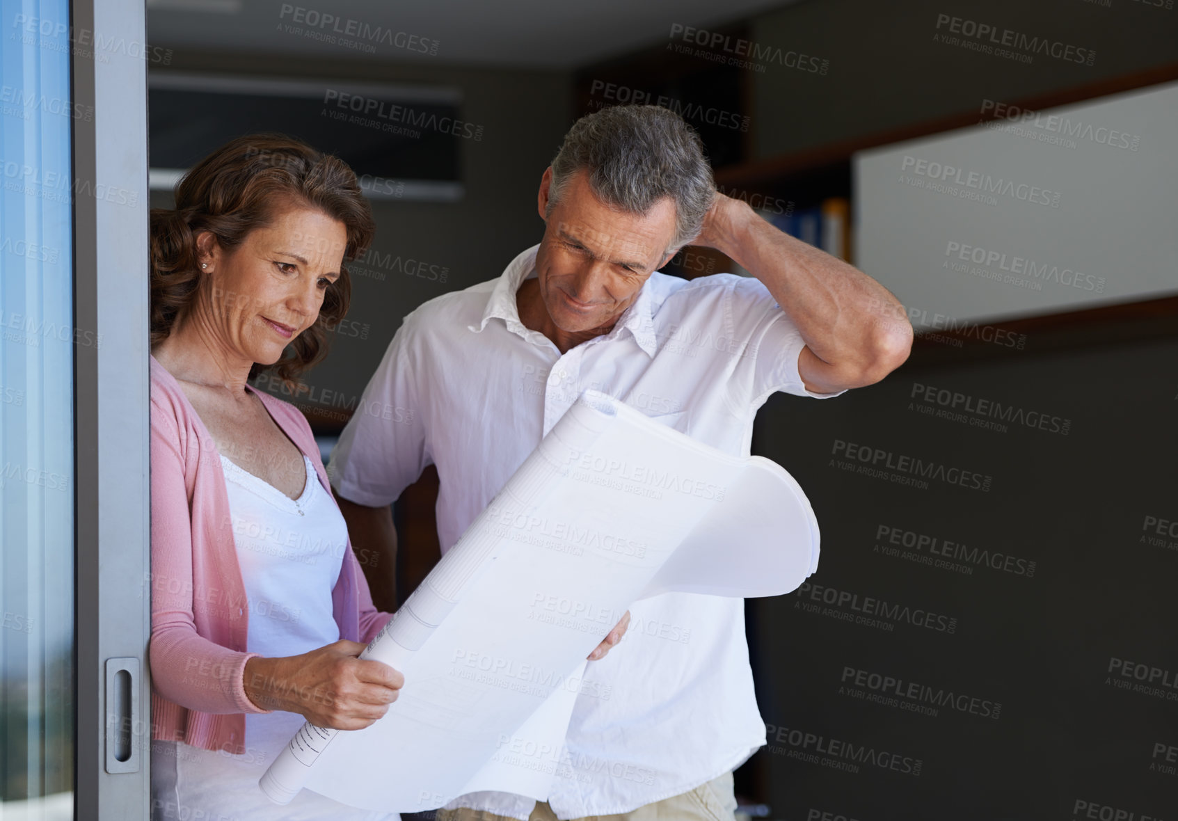 Buy stock photo Mature couple, planning and interior design with blueprint or documents for maintenance or renovation at house. Creative man or woman with paperwork or floor layout for home improvement or startup