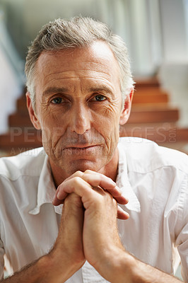 Buy stock photo Man, retirement and house with serious face for thinking, thoughts or ideas on staircase. Male pensioner, portrait and home with expression and wrinkles for retreat, senior person and confidence