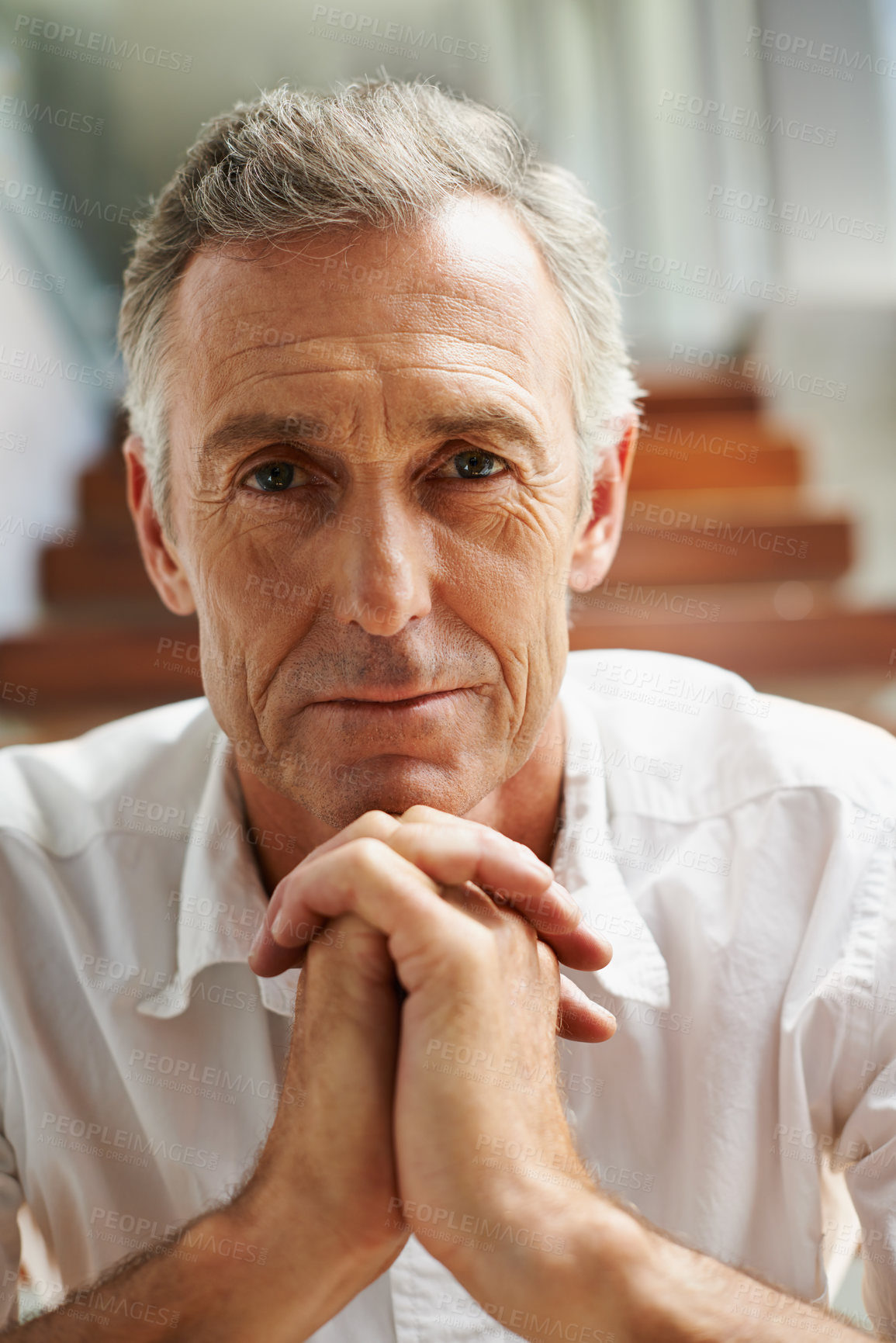 Buy stock photo Man, retirement and house with serious face for thinking, thoughts or ideas on staircase. Male pensioner, portrait and home with expression and wrinkles for retreat, senior person and confidence