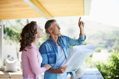 Buy stock photo Thoughtful mature couple with architecture blueprint for home development plan, renovation, improvement and extension. Designing, project innovation and planning new building and remodeling of house