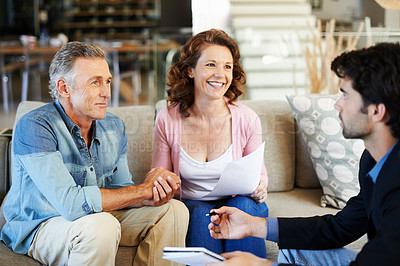 Buy stock photo Mature couple, broker and documents in house for mortgage for retirement in planning, finances and advice. Man, woman and consultant for pension, deal or agreement in lounge with advisor in home