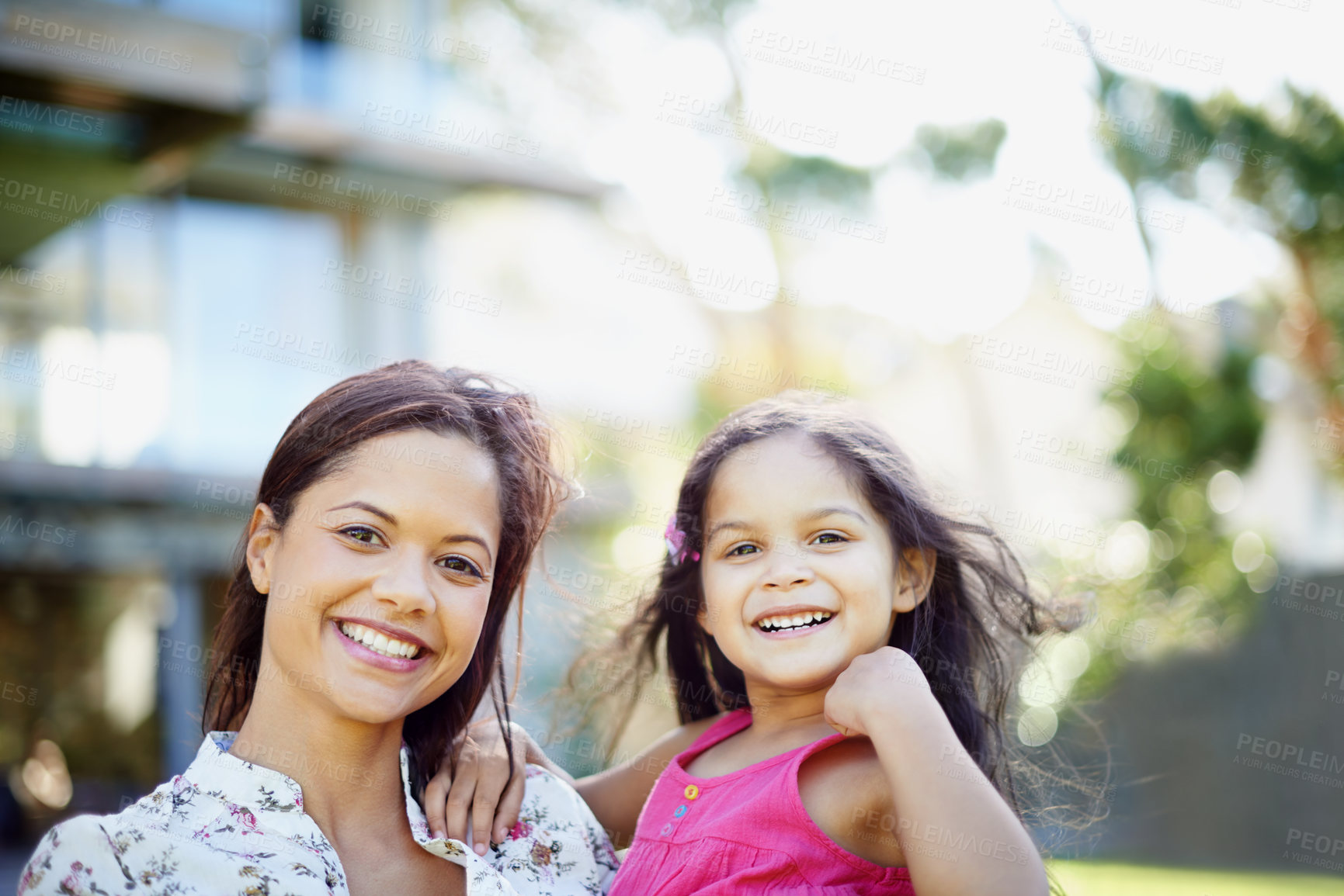 Buy stock photo Portrait, garden and hug with mother, girl and happiness with sunshine, playful and bonding together. Face, single parent and outdoor with mama, daughter and kid with weekend break, embrace and fun