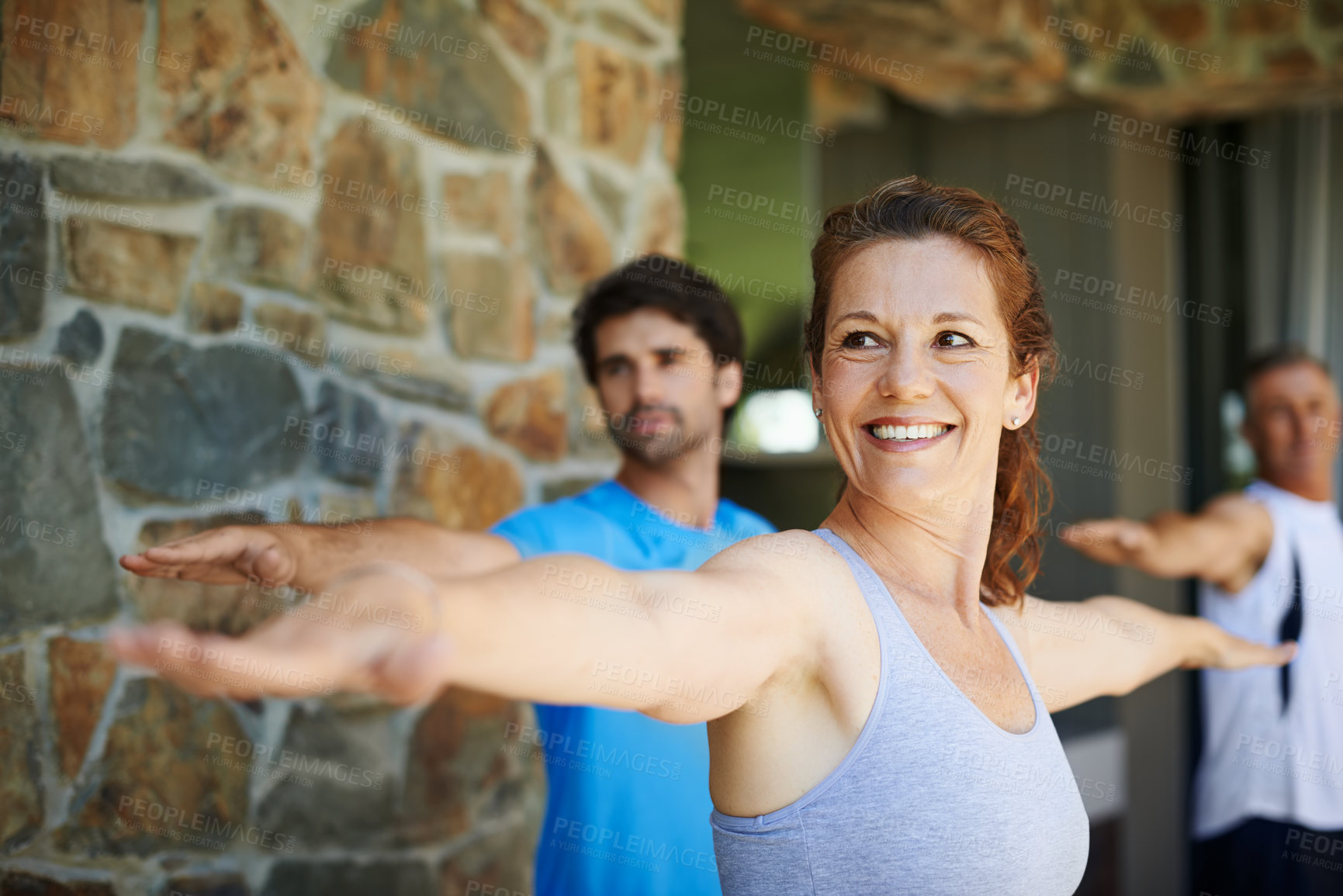 Buy stock photo Woman, pose and happy in yoga class for fitness and mental wellbeing, workout and daily lesson to coach people. Female yogini, warrior posture and yogis or students practice strength and balance. 