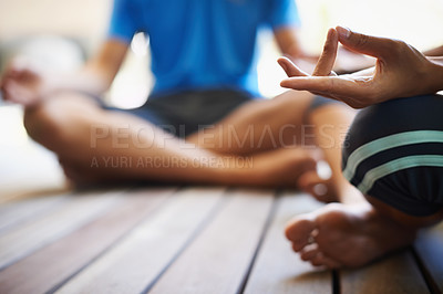 Buy stock photo Cropped view of a two people doing yoga in the lotus position