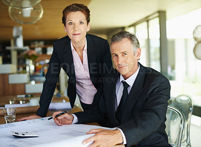 Buy stock photo Businessman, architect and portrait with plans, discussion and collaboration for engineering project. Mature woman, man and architecture with teamwork, blueprints and review for construction design