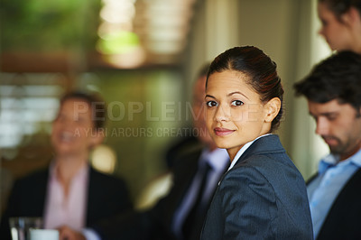 Buy stock photo A young businesswoman sitting in a corporate meeting