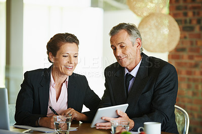 Buy stock photo Tablet, desk and mature business people for meeting with internet research, cooperation and planning investment strategy. Financial advisor, man and woman by table with tech and consultation notes