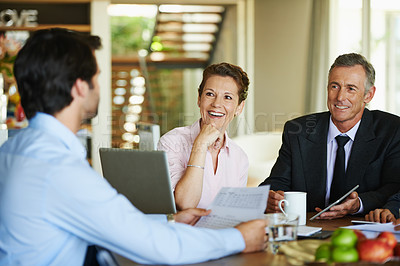 Buy stock photo Business people, teamwork and collaboration with laptop in office for meeting, discussion or negotiation. Corporate, colleagues or employees in workplace with tech talking for contract and feedback