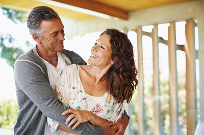Buy stock photo Porch, mature or happy couple hug in home for support, wellness or love in marriage for care or trust. Smile, outdoor or woman bonding with man in retirement or house to relax together for loyalty
