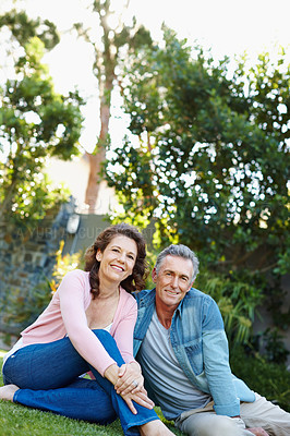 Buy stock photo Park, portrait and mature couple on grass for picnic date with love, care and bonding together in retirement. Nature, marriage and garden with people and relax in summer with travel and vacation