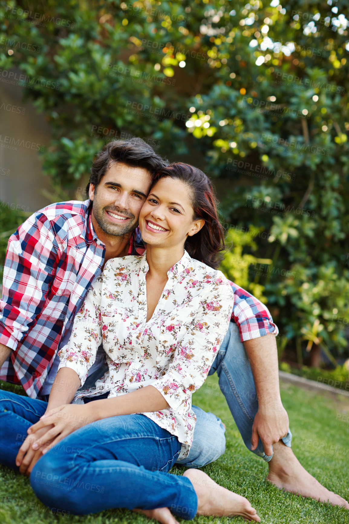 Buy stock photo Outdoor, portrait and embrace for couple, grass and happy in backyard, love and romance for people in home. Nature, man and woman on ground in park, smile and peace for marriage, honeymoon and rest