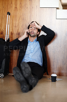 Buy stock photo Business man, travel and frustrated from phone call with burnout and fatigue from flight delay. Professional, suitcase and floor with mobile chat and problem with work deadline of corporate employee 