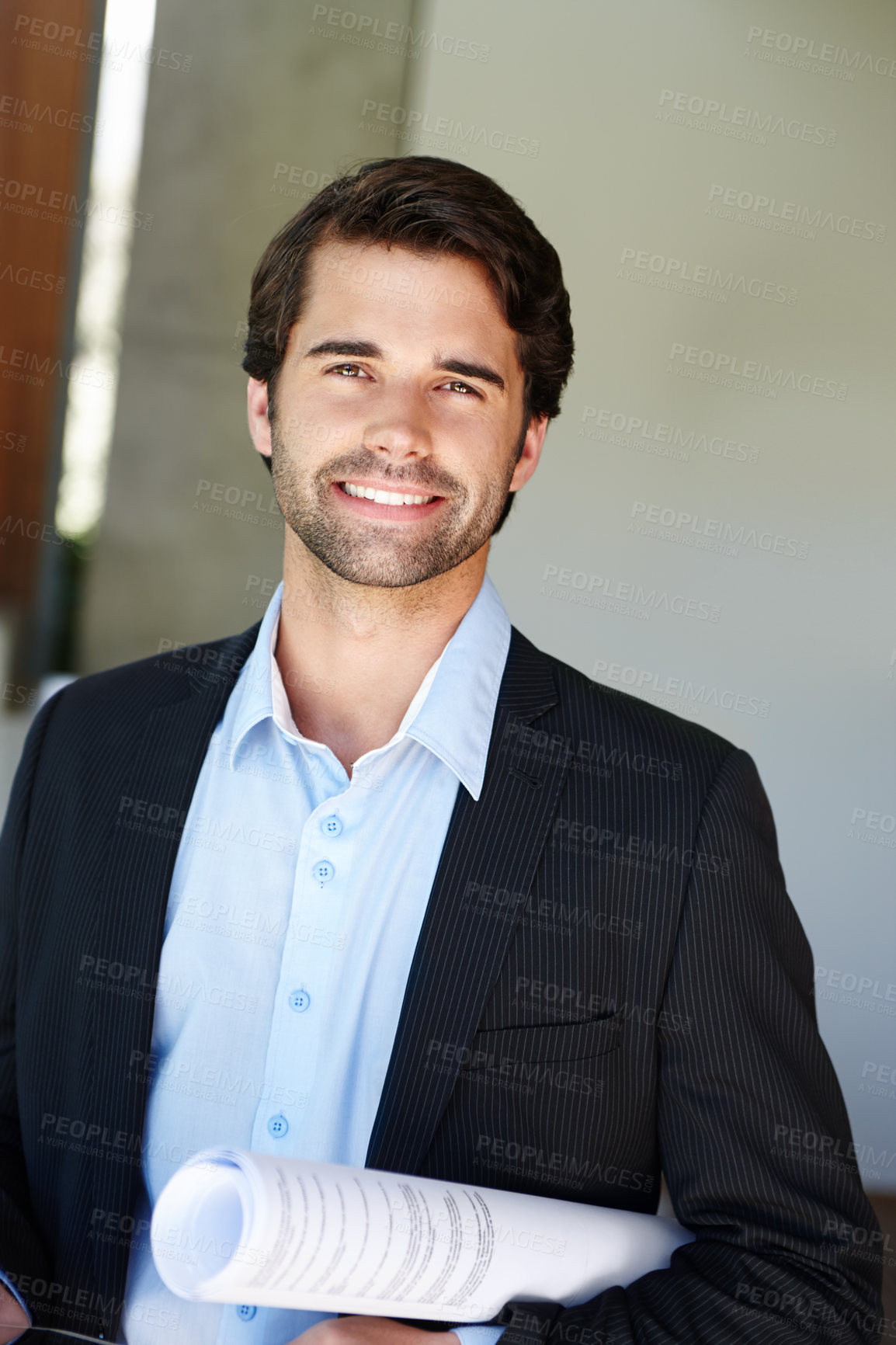 Buy stock photo Portrait, business man and pride with blueprint, paperwork and building design with smile. Architecture, male architect and contractor for renovation, floor plan and ready for meeting in workplace