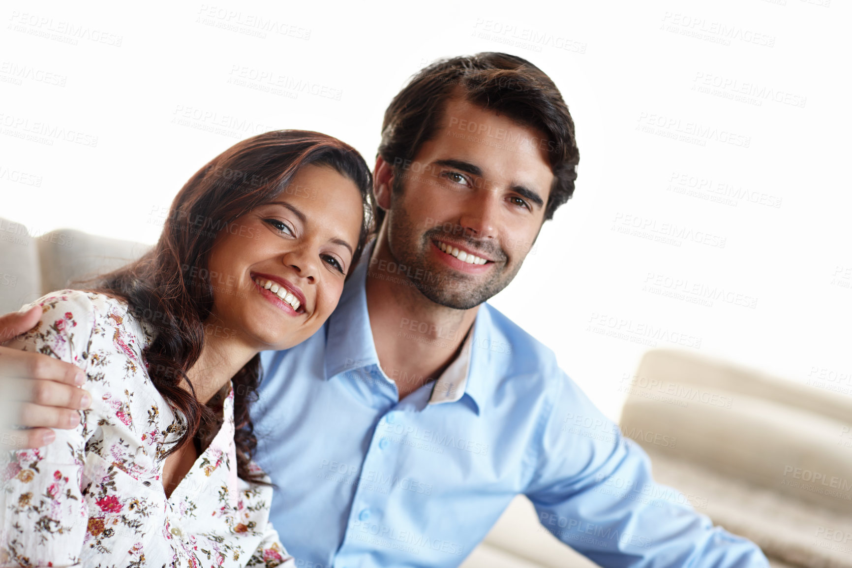 Buy stock photo Sofa, hug and portrait of couple with smile at home for support, love and bonding in commitment. Relax, man and woman with affection in living room for happiness, care and trust in relationship