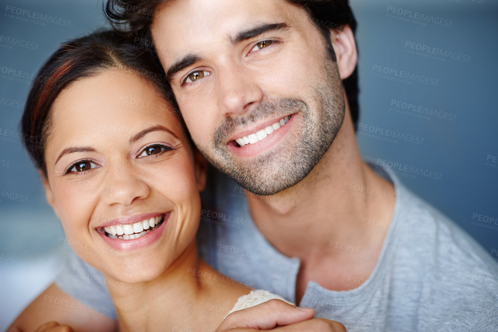 Buy stock photo Hug, portrait and support with couple in bedroom of home together for bonding, love or marriage. Face, smile or romance with happy man and woman in apartment to relax for morning or weekend time off