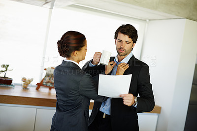 Buy stock photo Happy, man and woman helping with jacket for husband in kitchen with cue card for business meeting. Couple and female person fixing suit for grooming and support at home with paper for presentation