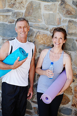 Buy stock photo Happy couple, portrait or mat for yoga, fitness or support for pilates, workout or exercise by brick wall. Mature, gym or proud people with smile, teamwork or healthy wellness for training for class