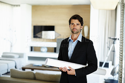 Buy stock photo Business man, portrait and serious with blueprint for planning, building design or floor plan on desk. Home office, architecture or male architect for project renovation, real estate or ideas