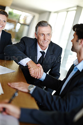Buy stock photo Handshake, partnership and business people in office for achievement, welcome and job contract. Thank you, senior ceo and worker for promotion or career opportunity with congratulations and b2b deal