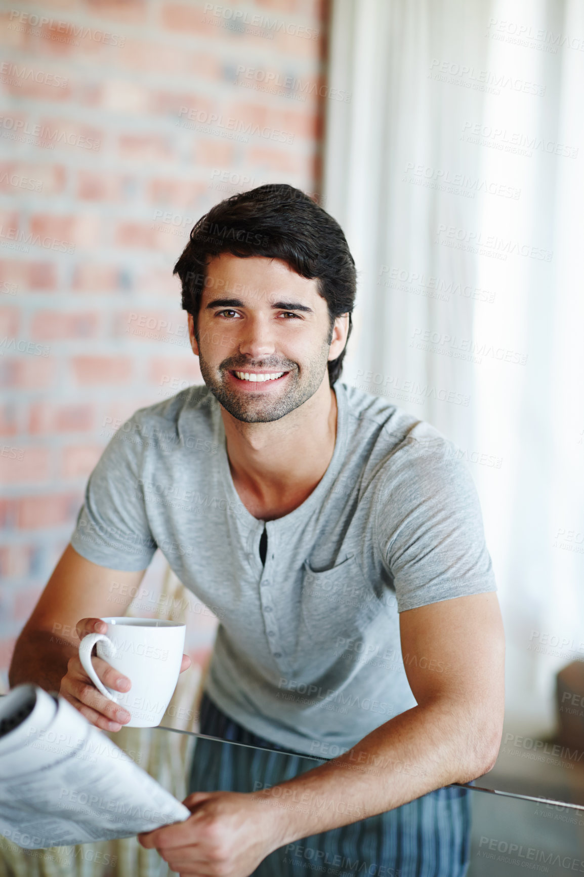 Buy stock photo House, man and newspaper with coffee in portrait for daily routine, smile and information with beverage. Morning, tea or relax on weekend in apartment with story, article or news in paper in Sweden.