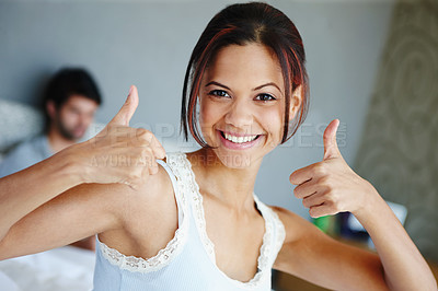 Buy stock photo Happy woman, portrait and bed with thumbs up in morning, vote or positive review at home. Young female person with smile, like emoji or yes sign for winning, support or positivity in bedroom at house