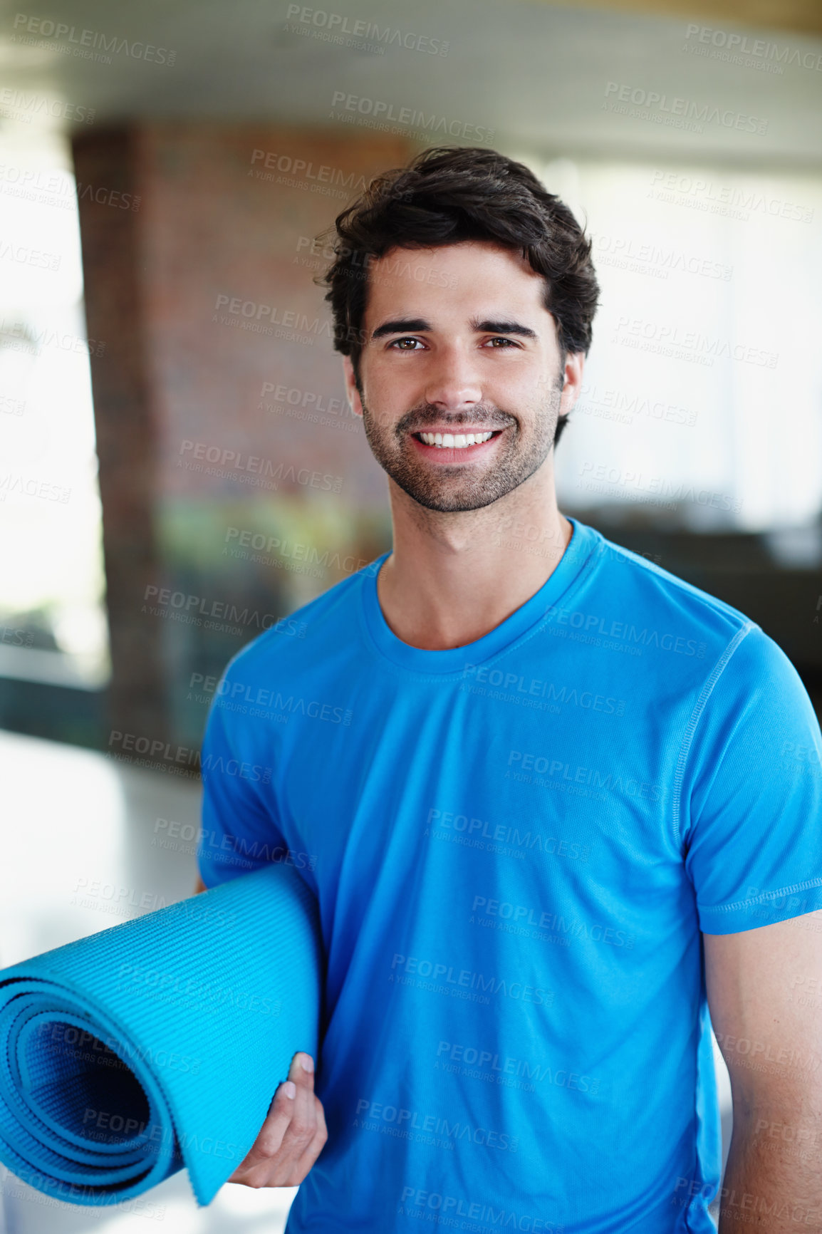Buy stock photo Happy man, portrait and fitness with yoga mat for pilates, exercise or indoor workout at gym. Handsome or young male person or yogi with smile for healthy wellness, training or mindset at health club