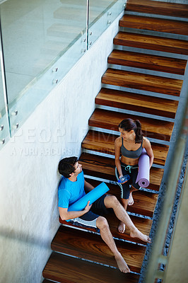 Buy stock photo Stairs, rest and man with woman for fitness, calm workout, yoga class and share health advice. Friends, exercise break and couple by steps for wellness and gossip conversation after training together