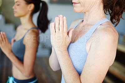Buy stock photo Cropped shot of a yoga class in progress