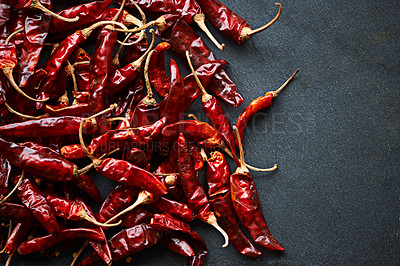 Buy stock photo Above, chilli and mockup for pepper, spices and flavor for dry ingredient for cooking, cuisine and food. Paprika, cayenne or condiment and spicy with red colour for capsicum and heat in dish or meal