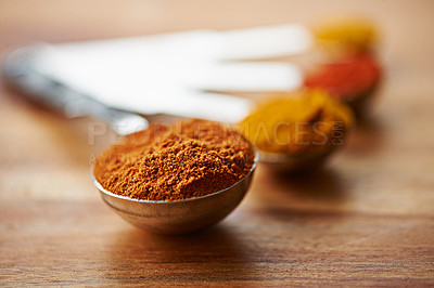 Buy stock photo Spoons, spice and collection of powder for cooking on kitchen table, turmeric and paprika for meal. Digestion, condiments and options for diet in Indian culture, weight loss and food preparation