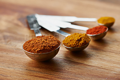 Buy stock photo Measuring, spoon and spices with ingredients for food, culinary and flavor with variety or choice for cooking. Chef tools, ground seasoning for meal and cuisine, catering and natural with aroma