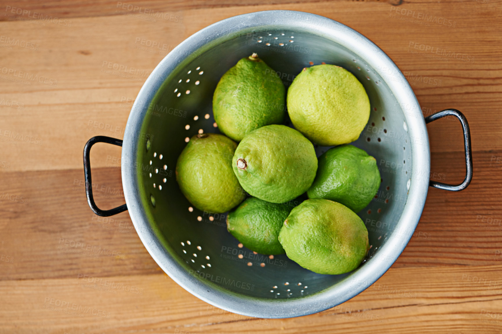 Buy stock photo Top view of fruit, lime and healthy food for snack, nutrition and wellness with citrus for vitamin c or detox. Organic ingredients, fresh green produce and balance in diet, sweet or sour for juice