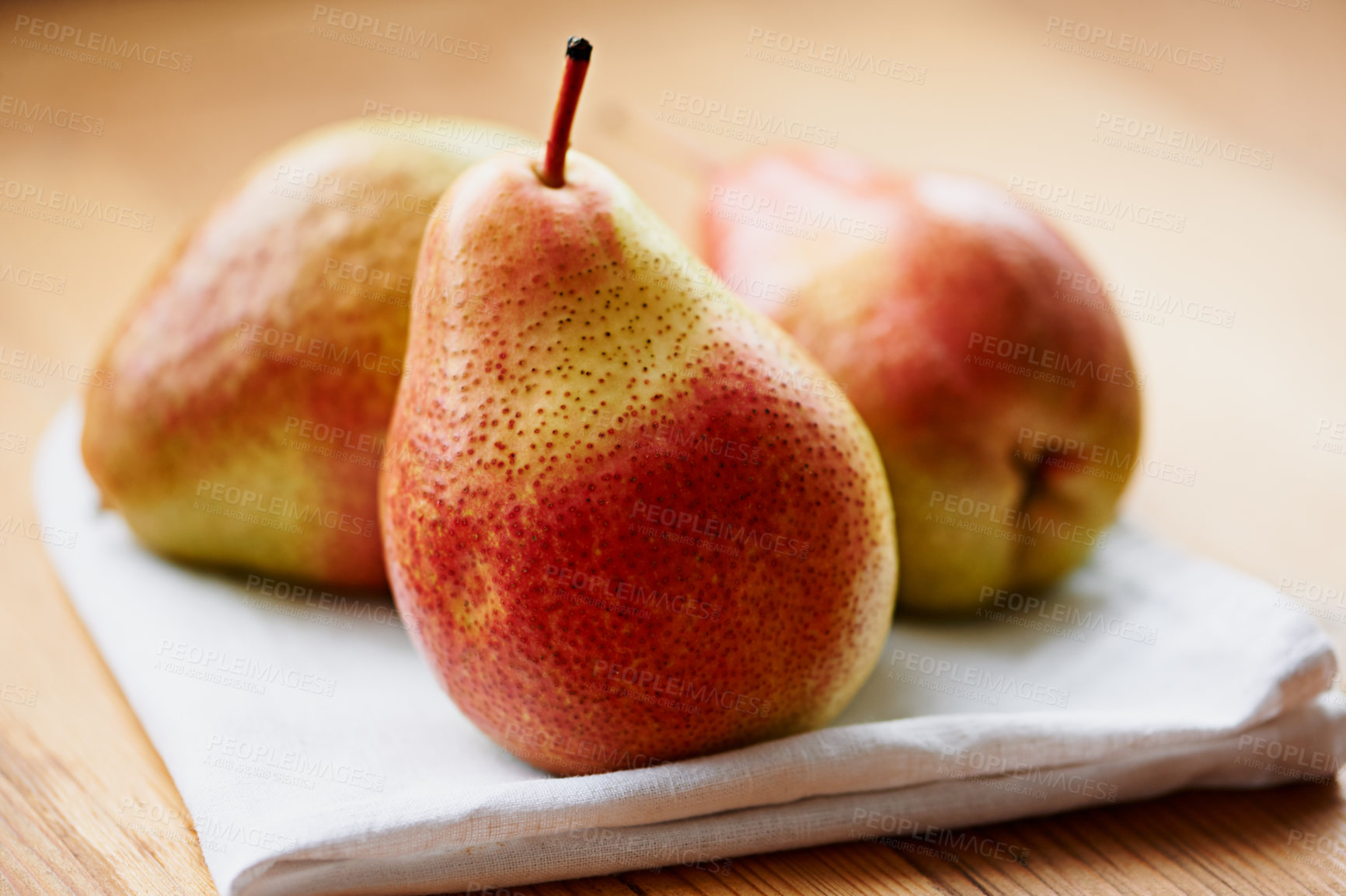 Buy stock photo Home, fruits or healthy pears in kitchen for fiber, organic or balanced diet for nutrition, meal or snacks. Background, vegan or closeup of natural ingredients for vitamins, fresh produce or raw food