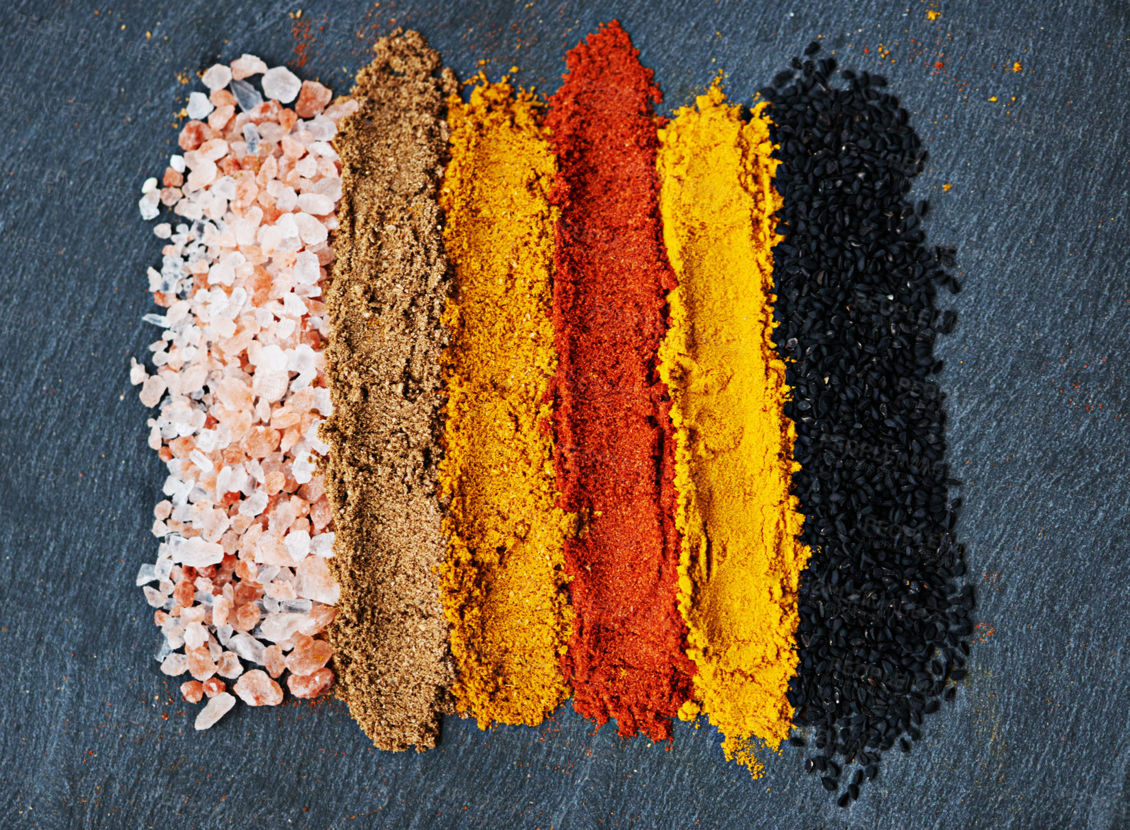 Buy stock photo Row, spice and selection of powder for cooking, turmeric and paprika for meal. Top view, condiments and options for spicy gourmet in Indian culture, cumin and food preparation in closeup for aroma