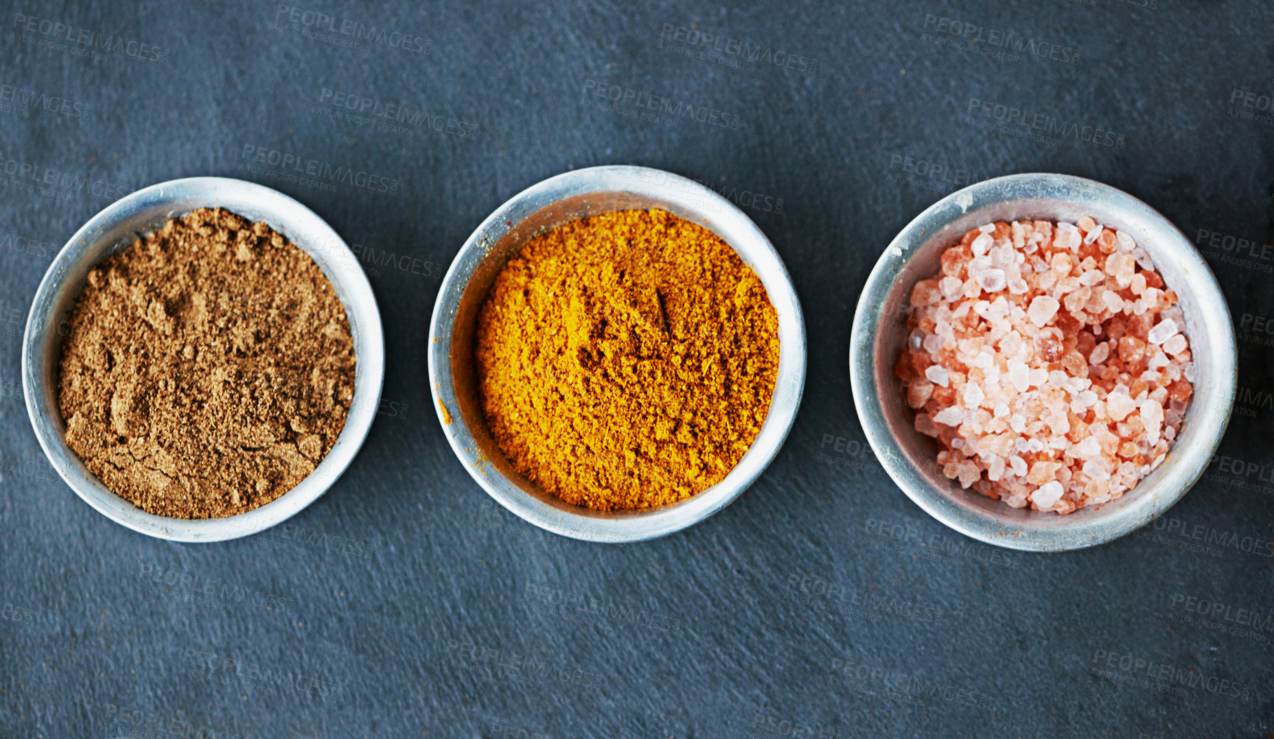 Buy stock photo Top view, spices in bowl and ingredients for food, culinary and flavor with powder or ground seasoning for cooking background. Sea salt, cinnamon and turmeric for meal and cuisine with catering