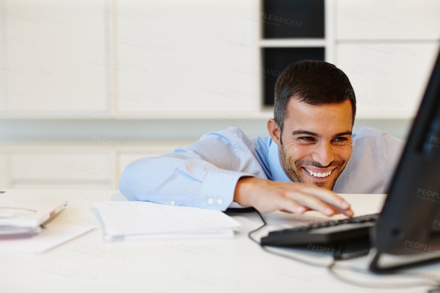 Buy stock photo Happy, businessman and waiting for feedback, good news or announcement with computer in office. Excited, male person or employee with tech and paperwork for email response, communication and contact