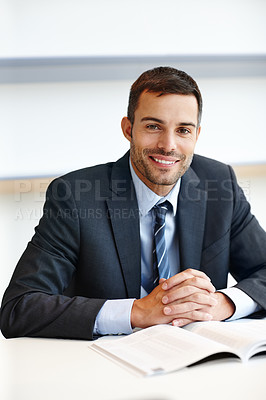 Buy stock photo Businessman, portrait and book in office for professional development, constitution for property rights. Male attorney, education and happy for personal growth, reading values for real estate law