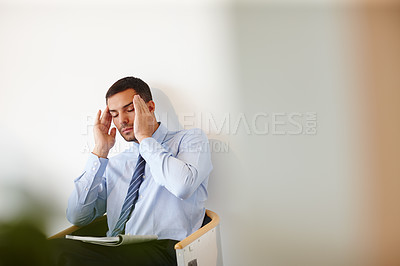 Buy stock photo Businessman, headache and stress in waiting room for job, meeting and appointment in office. Accountant, mental health and overworked for financial career, economy and stock market with mockup 