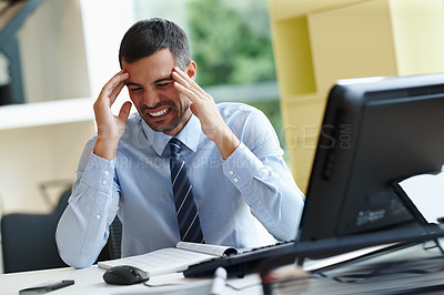 Buy stock photo Frustrated businessman, headache and documents with stress in anxiety, fatigue or debt at office. Young man, accountant or employee with migraine in depression, bankruptcy or financial crisis at desk