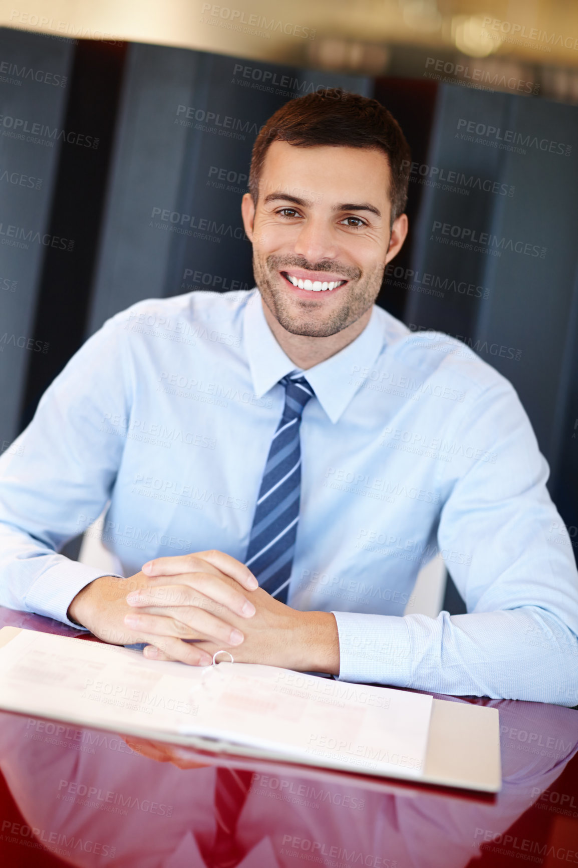 Buy stock photo Lawyer, man and smile on portrait in office for career or job growth and opportunity with startup business. Male employee, happy and confident with folder at law firm as attorney or legal advisor