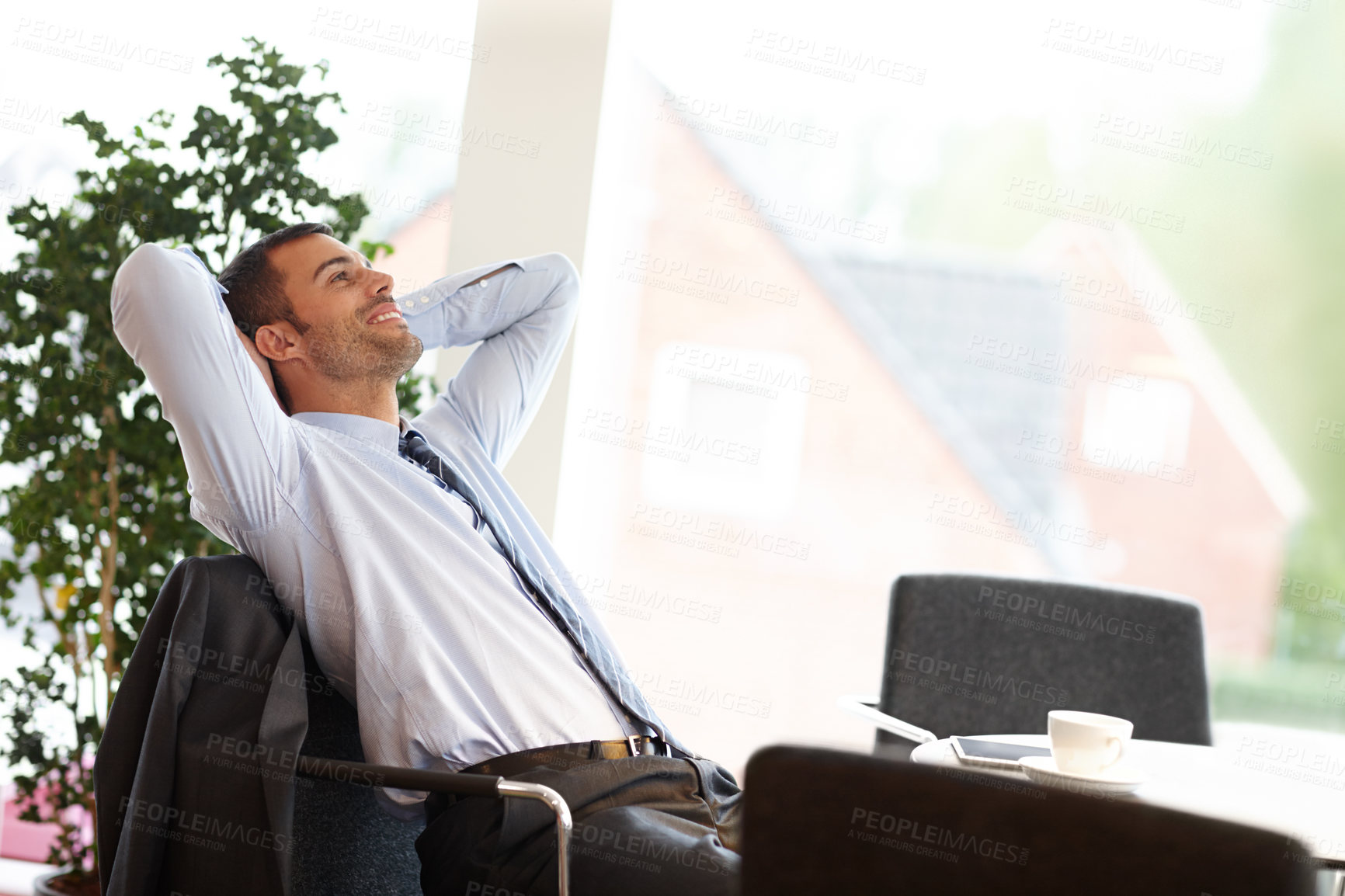 Buy stock photo Relax, businessman and smile at desk with relief for weekend, break and productivity in agency. Lawyer, stretching and hands behind head for brainstorming, dream and rest in office for startup idea