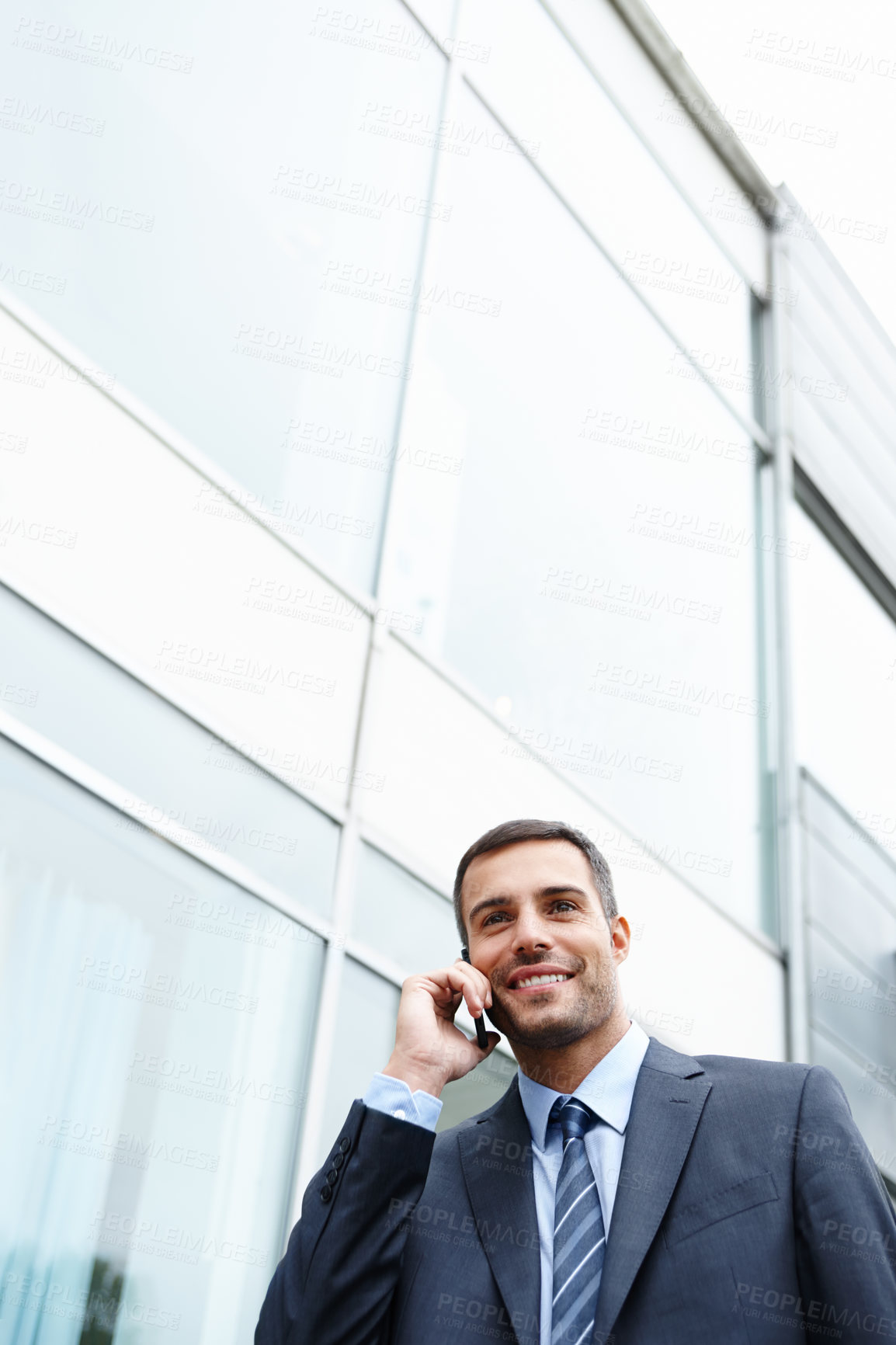 Buy stock photo Phone call, good news or confident businessman by building talking for conversation or deal communication. Outdoor, banker or happy financial advisor networking for investment, negotiation or chat