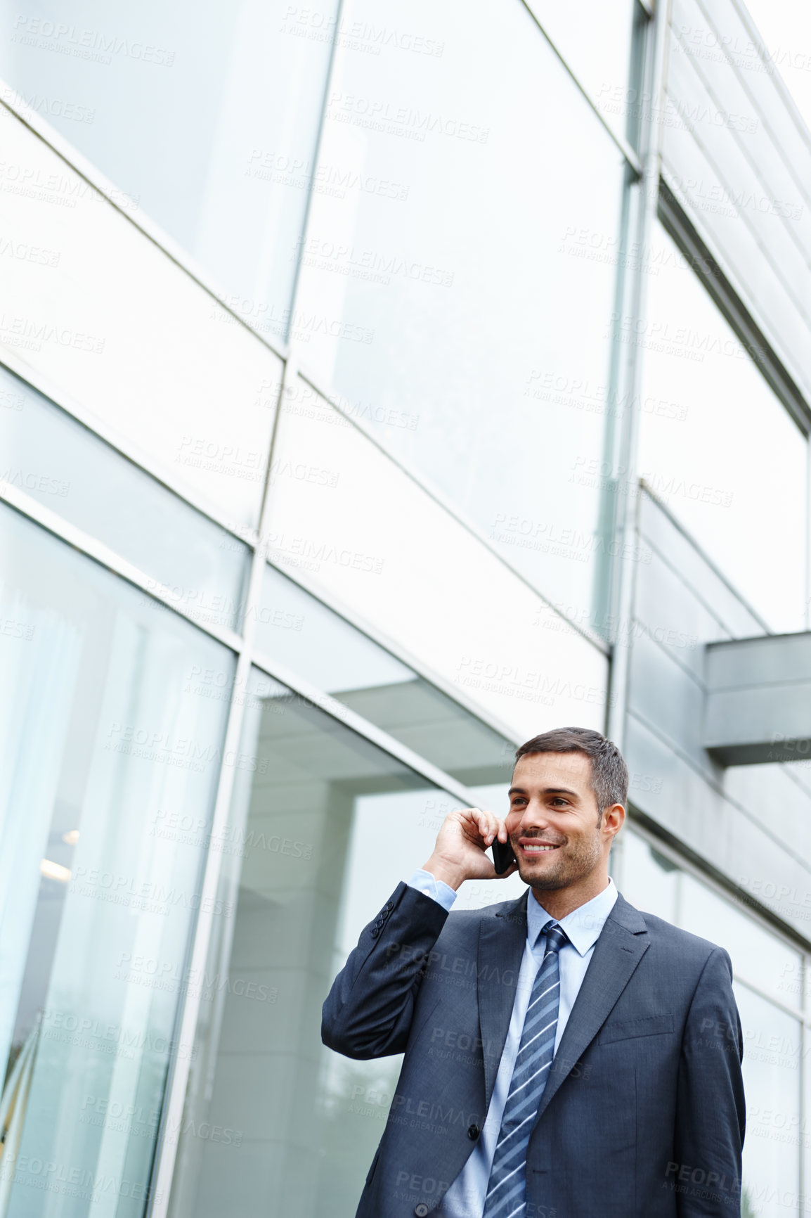 Buy stock photo Phone call, outdoor or confident businessman by building talking for conversation or deal communication. Smile, banker or happy financial advisor networking for investment with negotiation in city