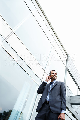 Buy stock photo Phone call, low angle or businessman by outdoor building talking for conversation or deal communication. News, proud banker and happy financial advisor networking for investment, negotiation or chat