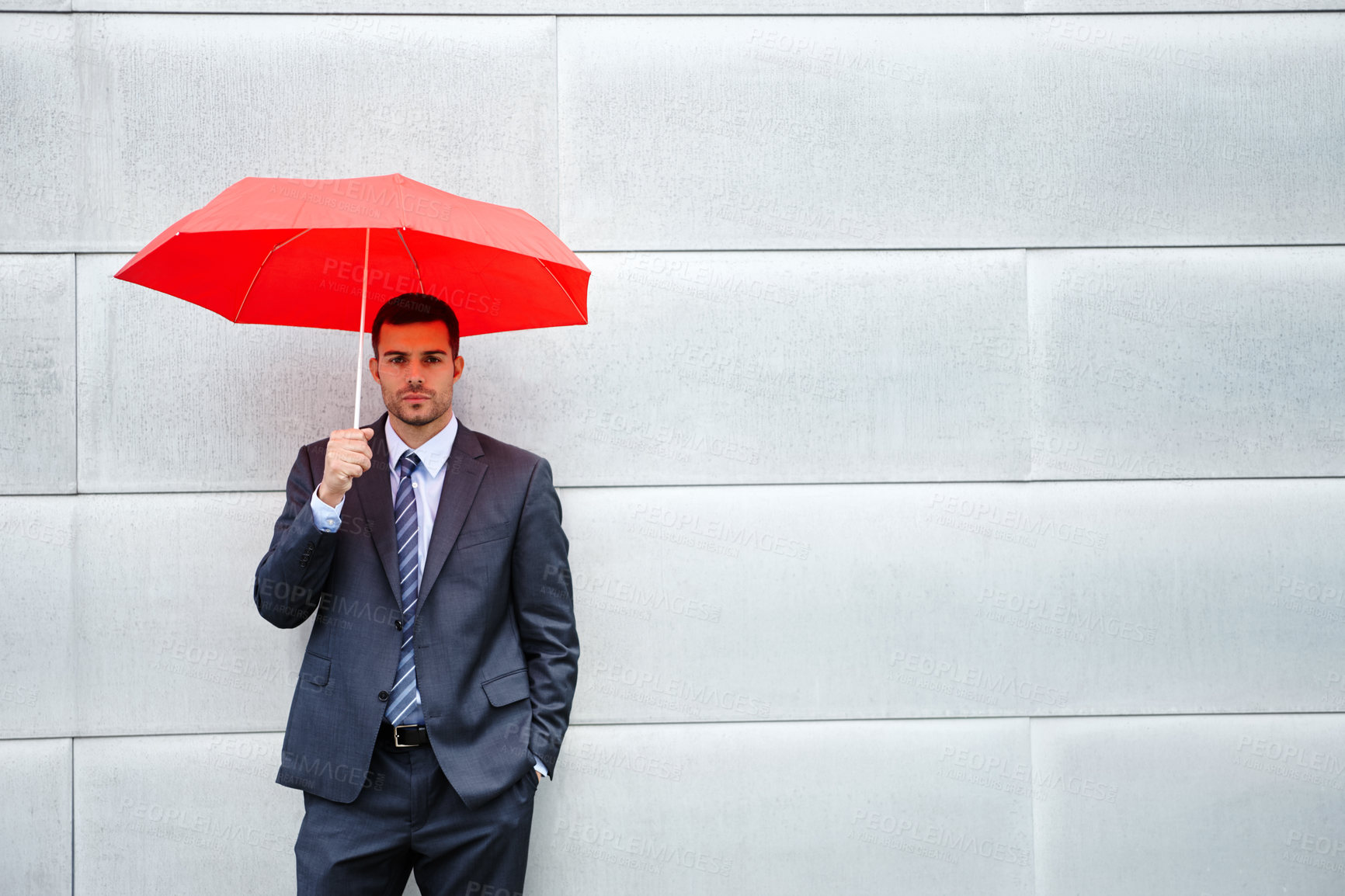 Buy stock photo Portrait, business and man in city, umbrella and confidence with employee, wall background and cold. Person, consultant and agent with cover from rain, weather and travel with protection in winter