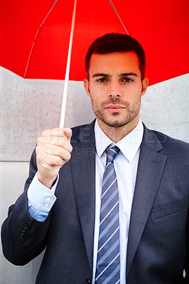 Buy stock photo Businessman, umbrella and suit in portrait with executive or professional for life insurance policies. Cover, outside and consultant for claims, policy and serious asset advisor or broker in New York