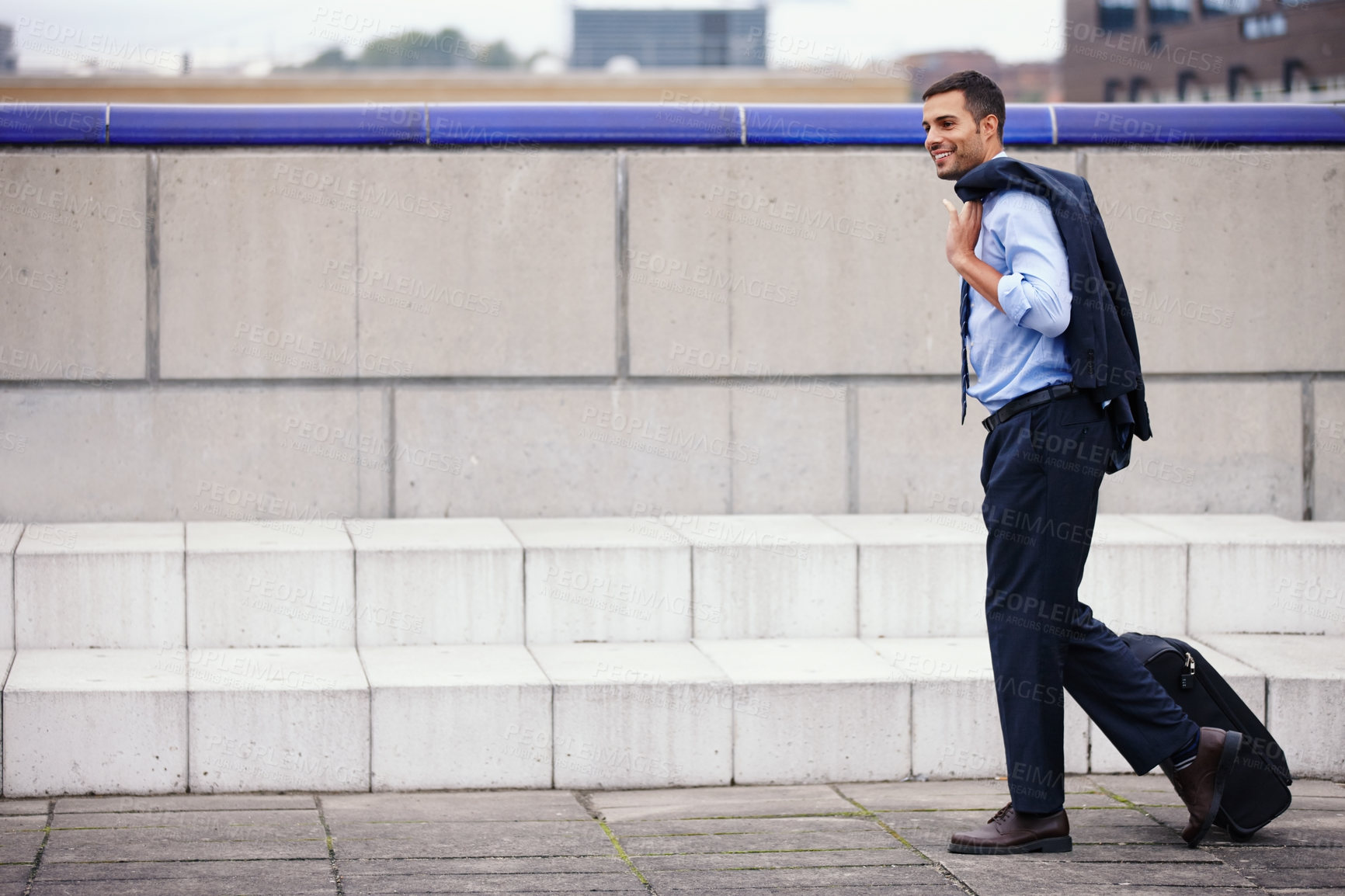 Buy stock photo Happy, businessman and walking with luggage for morning commute to work on urban street or sidewalk. Smile, male person or employee and travel with formal suit on city pavement for running to meeting