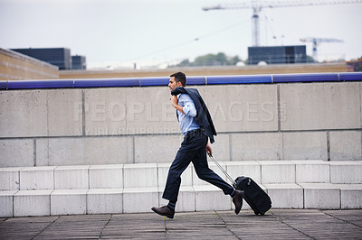 Buy stock photo Worried, business man and running late for travel or flight journey outdoor on city sidewalk. Stress, male person or employee with suitcase for rush or hurry to plane booking for work trip commute